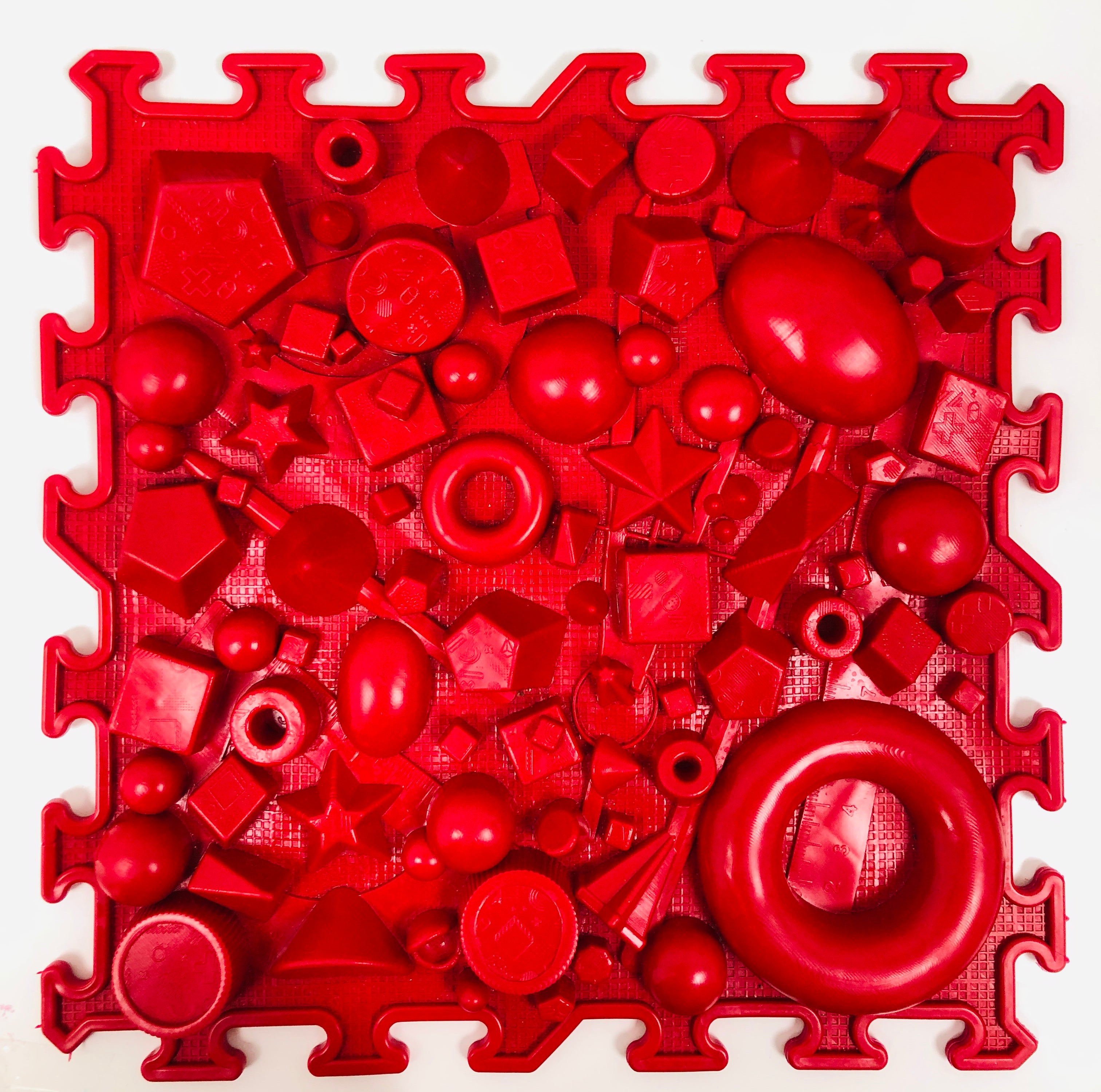 Tapis texturé sensoriel rouge