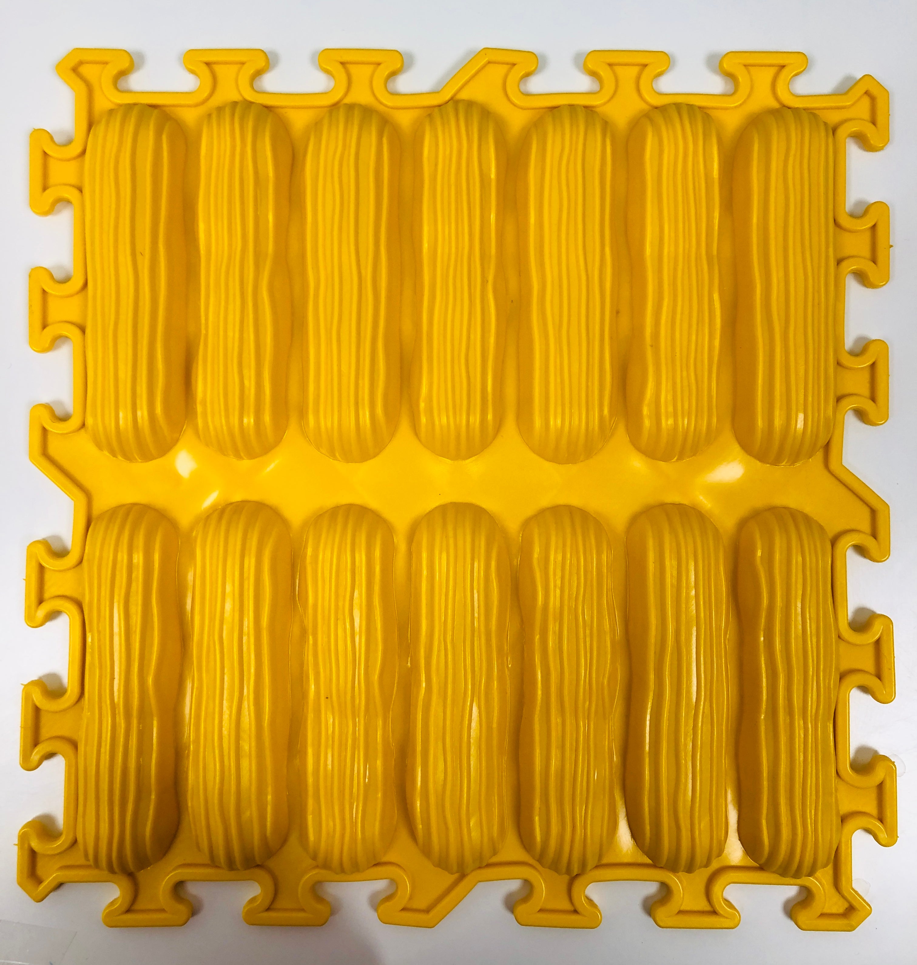 Tapis texturé sensoriel jaune