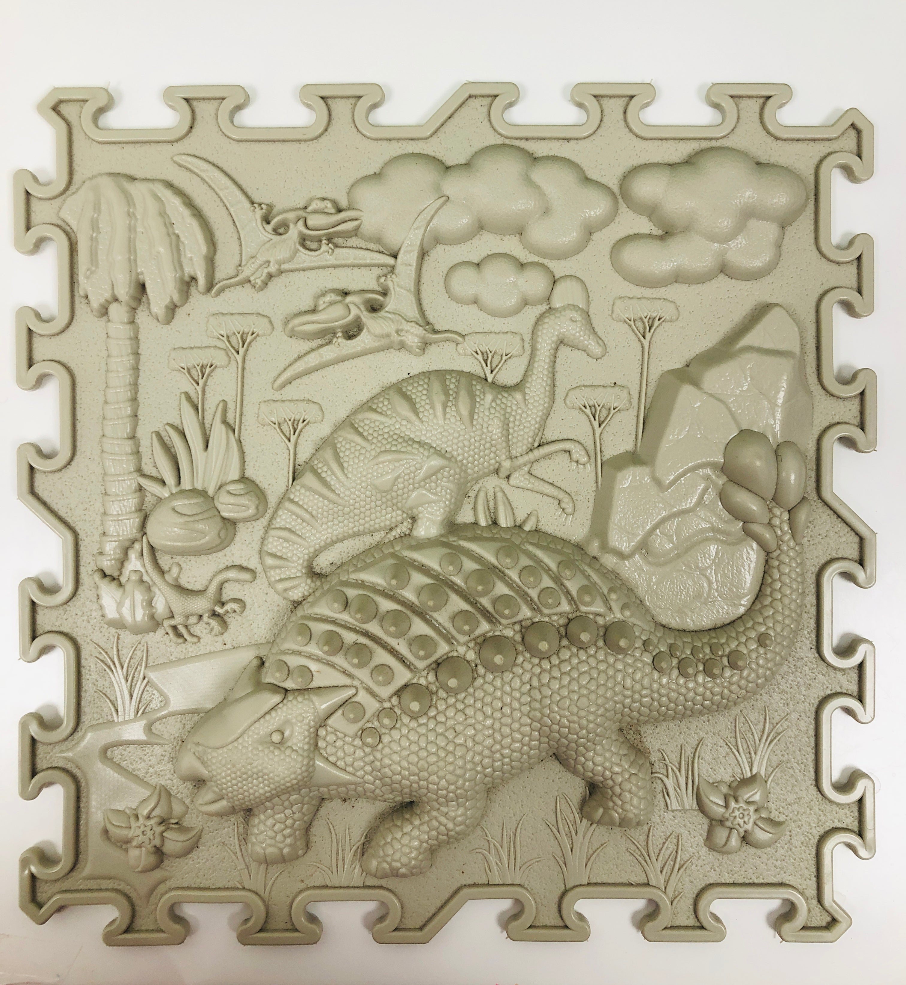 Tapis texturé sensoriel Dino